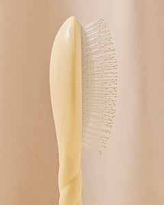 N.04 La Brosse Démêlante & Massante La Miracle Ivoire Cair