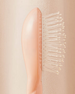 N.04 La Micro Brosse Démêlante & Massante La Miracle Rose Poudré