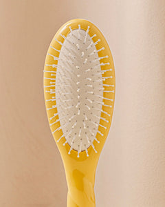 N.04 La Petite Brosse Démêlante & Massante La Miracle Jaune Safran