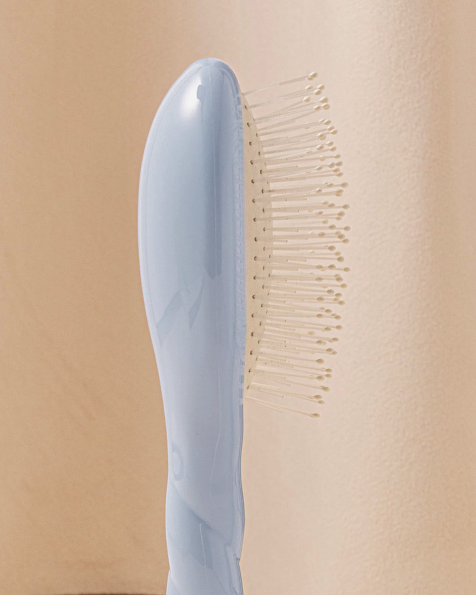 N.04 La Petite Brosse Démêlante & Massante La Miracle Bleu Ciel
